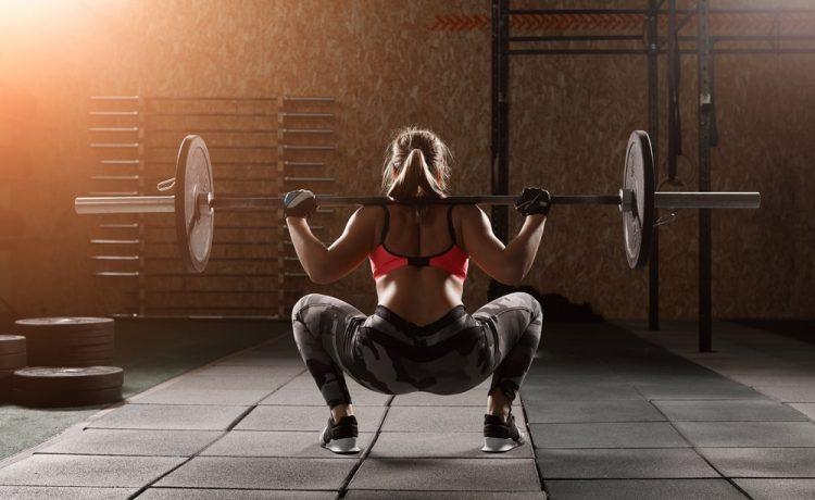 Squatting in the gym to help with golf