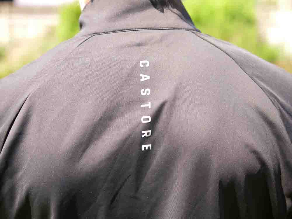 Castore Pinnacle jacket with label on the back