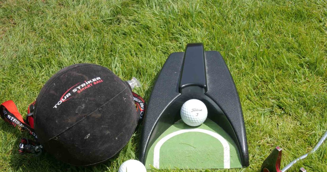 Tour Strike smart ball with Putting machine to help you play better golf by practicing at home